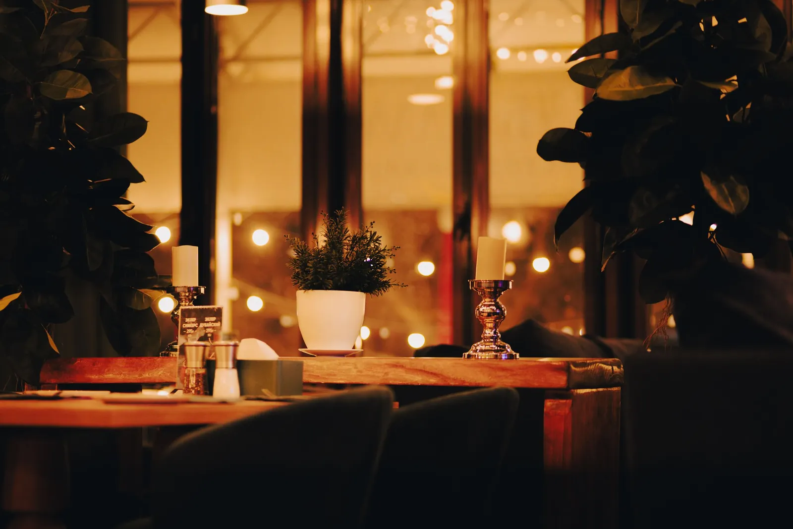 A candlelit table set for dinner